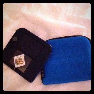 Blue Nintendo 2DS with Super Smash Bros game